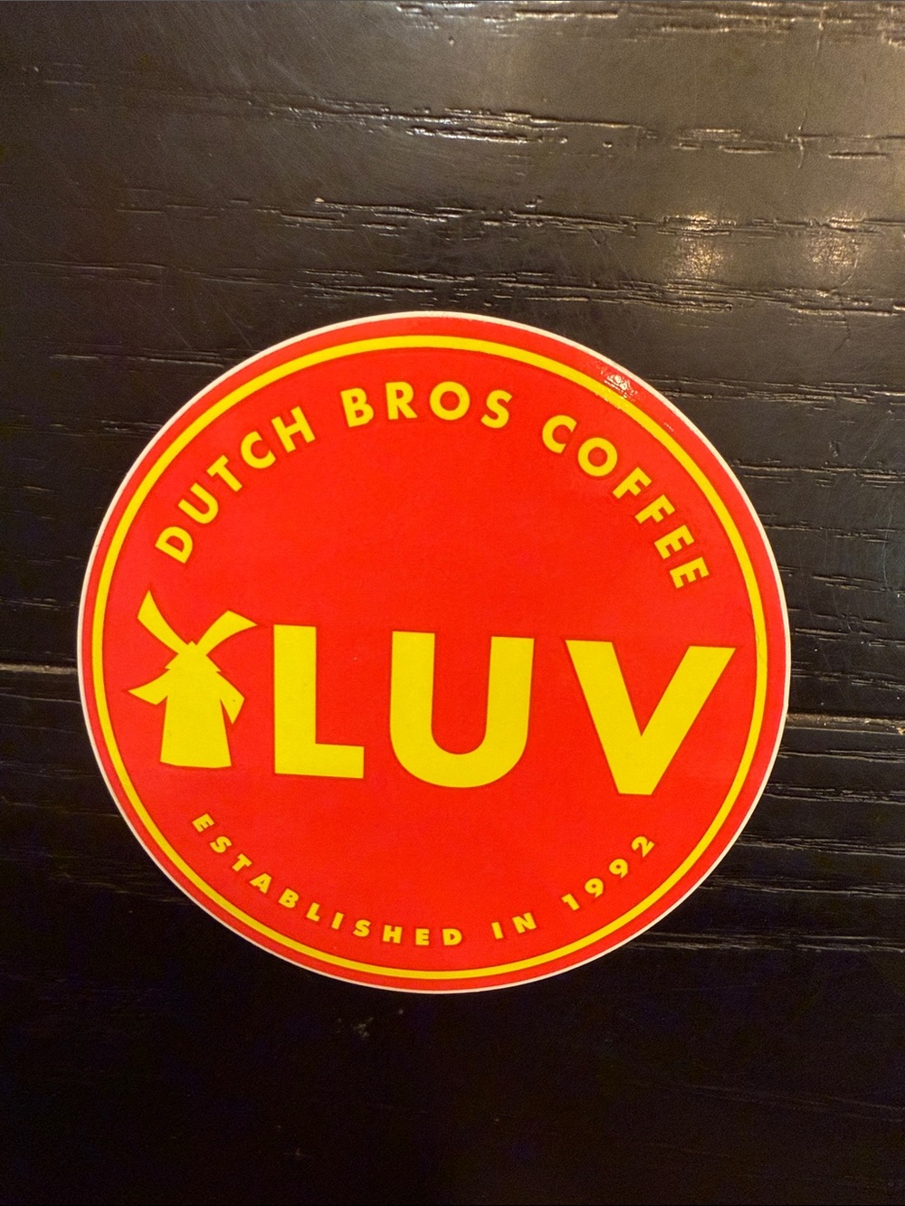 Dutch Bros LUV Sticker in Red and Yellow